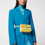 "Alexander Wang x Bvlgari" belt bag in smooth Amaranth Garnet red calfskin. New double Serpenti head closure in antique gold-plated brass with alluring red enamel eyes. SFW-001-1029S image 7