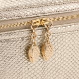Serpenti Forever jewellery box bag in light gold Molten karung skin with black nappa leather lining. Captivating snakehead zip pullers and chain strap decors in light gold-plated brass. 1177-MoltK image 7