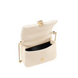 Serpenti Cabochon micro bag in ivory opal calf leather with a maxi matelassé pattern and black nappa leather lining. Captivating snakehead closure in gold-plated brass embellished with red enamel eyes. SCB-NANOCABOCHONa image 2