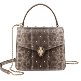 Serpenti Forever small top handle bag in foggy opal grey shiny karung Cabochon skin with crystal rose nappa leather lining. Captivating snakehead magnetic closure in light gold-plated brass embellished with black enamel and light gold-plated brass scales, and black onyx eyes. 293334 image 1