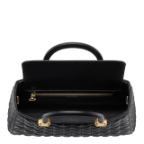 Serpentine Day Duo top handle bag in black calf leather with Calla matelassé motif and black nappa leather lining. Captivating double-head snake body-shaped handles in gold-plated brass embellished with matching calf leather inserts. SRN-001-1315M image 3