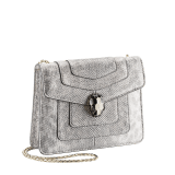 Serpenti Forever small crossbody bag in milky opal beige metallic karung skin with milky opal beige nappa leather lining. Captivating snakehead closure in light gold-plated brass embellished with black and glitter milky opal beige enamel scales and black onyx eyes. 422-MK image 2