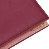 Bulgari Logo compact wallet in primrose quartz pink calf leather with hot-stamped Infinitum pattern all over and anemone spinel pinkish-red nappa leather interior. Light gold-plated brass hardware and press-stud closure. BVL-COMPACTWLTa image 4