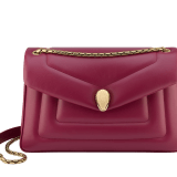 Serpenti Reverse medium shoulder bag in Sahara amber light brown quilted Metropolitan calf leather with taffy quartz pink nappa leather lining. Captivating snakehead magnetic closure in gold-plated brass embellished with red enamel eyes. 1223-MCL image 2