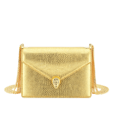 "Serpenti Forever" multichain shoulder bag in "Molten" light gold karung skin with black nappa leather inner lining, offering a touch of radiance for the Winter Holidays. New Serpenti head closure in light gold-plated brass, complete with ruby-red enamel eyes. 1107-MK image 1