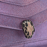 Serpenti Forever East-West small shoulder bag in sheer amethyst lilac Gleamy karung skin with primrose quartz pink nappa leather lining. Captivating magnetic snakehead closure in light gold-plated brass, embellished with black and pearled pinkish lilac enamel scales and black onyx eyes. 292791 image 5