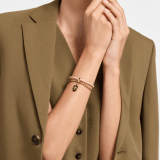 Serpenti Forever bracelet in star rose pink braided calf leather and gold-plated brass chain with magnetic clasp closure. Captivating snakehead charm with black and transparent enamel scales, and black enamel eyes. SERP-BRAIDCHAIN-D image 2