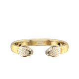 "Serpenti Forever" bangle bracelet in gold "Molten" karung skin. New contraire Serpenti head embellishment in light gold-plated brass, finished with seductive red enamel eyes. SPContr-MoltK-G image 1