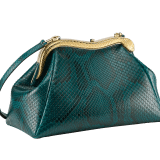 Serpentine medium pouch in teal topaz green soft and shiny python skin with violet amethyst nappa leather lining. Captivating snake body-shaped frame in gold-plated brass embellished with engraved scales and red enamel eyes on one side and teal topaz green soft shiny python skin insert on the other, with press button closure. 292583 image 2