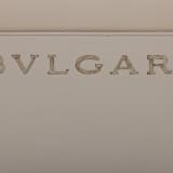 Bulgari Logo small tote bag in foggy opal grey smooth and grained calf leather with linen agate beige grosgrain lining. Iconic Bulgari logo decorative chain in light gold-plated brass, with hook fastening. BVL-1202SCLL image 5