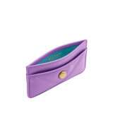 Serpenti Cabochon card holder in sheer amethyst lilac calf leather with a maxi quilted pattern and watercolour opal light blue nappa leather lining. Captivating snakehead rivet in gold-plated brass embellished with red enamel eyes. SCB-CCHOLDERa image 2