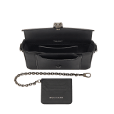Serpenti Forever small unisex crossbody bag in matt black calf leather with black nappa leather lining and decorative chain. Captivating snakehead closure in dark ruthenium-plated brass embellished with red enamel eyes. 293022 image 6