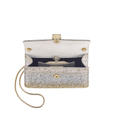 Serpenti Forever mini crossbody bag in natural suede with different-size gold crystals and black nappa leather lining. Captivating magnetic snakehead closure in gold-plated brass embellished with "diamantatura" engraving on the scales and black onyx eyes. 986-CDS image 4
