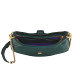 Serpenti Ellipse medium shoulder bag in Urban grain and smooth ivory opal calf leather with flamingo quartz pink grosgrain lining. Captivating snakehead closure in gold-plated brass embellished with black onyx scales and red enamel eyes. 1190-UCL image 4