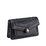 Serpenti Forever East-West small shoulder bag in black calf leather with emerald green gros grain lining. Captivating snakehead magnetic closure in light gold-plated brass embellished with black and white agate enamel scales, and green malachite eyes. 1237-CLa image 2