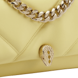 "Serpenti Cabochon" maxi chain crossbody mini bag in soft quilted Ivory Opal white calf leather, with a maxi graphic motif, and black nappa leather internal lining. New Serpenti head closure in gold-plated brass, finished with small white mother-of-pearl scales in the middle, and red enamel eyes. 1164-MSMa image 6