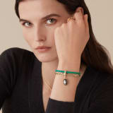 "Serpenti Forever" bracelet in braided, emerald-green calfskin with snake body-shaped chain in light gold-plated brass, iconic snakehead charm in black and agate-white enamel, black enamel eyes and magnetic clasp fastening. SerpBraidChain-WCL-EG image 2