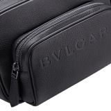 BULGARI Man small camera bag in black smooth and grainy metal-free calf leather with Olympian sapphire blue regenerated nylon (ECONYL®) lining. Dark ruthenium-plated brass hardware, hot stamped BULGARI logo and zipped closure. BMA-1206-CL image 7