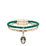 Serpenti Forever bracelet in emerald green braided calf leather and light gold-plated brass chain with magnetic clasp closure. Captivating snakehead charm with black and white agate enamel scales and black enamel eyes. SerpBraidChain-WCL-EG image 1