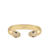 Serpenti Forever bangle bracelet in gold-finished brass with soft gold nappa leather inserts. Captivating contraire snakehead motif in gold-finished brass embellished with pavé-set white zirconia stones and black enamel eyes. BRACLT-SP-CONTR-softnappa image 1