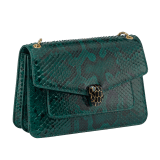 Serpenti Forever medium shoulder bag in Forest Emerald green shiny python skin with black nappa leather lining. Captivating snakehead press button closure in gold-plated brass embellished with black enamel scales, and black onyx eyes. 292580 image 2
