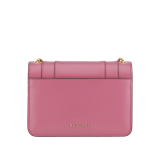 “Serpenti Forever” crossbody bag in Lavender Amethyst lilac calf leather, and Reef Coral red grosgrain inner lining. Iconic snakehead closure in light gold-plated brass enhanced with black and white agate enamel, with green malachite eyes. 1082-CLb image 3