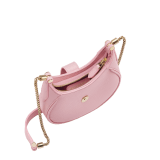 Serpenti Ellipse micro bag in soft, drummed, flash diamond white calf leather with taffy quartz pink grosgrain lining. Captivating snakehead closure in gold-plated brass embellished with mother-of-pearl scales and red enamel eyes, leather tab with magnet, and zippered fastening. SEA-MICROHOBOc image 2