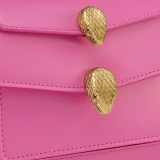 Alexander Wang x Bulgari small belt bag in azalea quartz pink calf leather with black nappa leather lining. Captivating double Serpenti head magnetic closure in antique gold-plated brass embellished with red enamel eyes. 292314 image 5