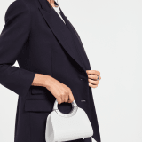 Bvlgari Roma mini top handle bag in flash diamond white Metropolitan calf leather with milky opal nappa leather lining. Iconic metal detail in palladium-plated brass engraved with the Bvlgari logo, and magnetic press-button closure. BVR-001-1310XS-CALF image 1