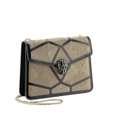 “Serpenti Forever” crossbody bag in black calf leather with a Million Chain motif. Iconic snake head closure in light gold plated brass enriched with black enamel and black onyx eyes. 422-CP image 2