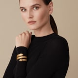"Serpenti Forever" multi-coil Cleopatra bangle in "Molten" gold karung skin, offering a touch of radiance for the Winter Holidays. New double Serpenti head in gold-plated brass, complete with ruby-red enamel eyes. Cleopatra-MK-G image 2