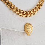 Serpenti Forever Maxi Chain small crossbody bag in flash diamond white grained calf leather with foggy opal gray nappa leather lining. Captivating snakehead magnetic closure in gold-plated brass embellished with white mother-of-pearl scales and red enamel eyes. 1134-MCGC image 4