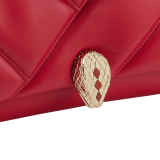 "Serpenti Cabochon" small maxi chain crossbody bag in soft quilted Blush Quartz pink calf leather, with a maxi graphic motif, and Deep Garnet burgundy nappa leather internal lining. New Serpenti head closure in gold plated brass, finished with small pink mother-of pearl scales in the middle and red enamel eyes. 1165-NSM image 6