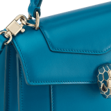 Serpenti Forever medium top handle bag in emerald green calf leather with black nappa leather lining. Captivating snakehead magnetic closure in light gold-plated brass embellished with deep jade intense green enamel and light gold-plated brass scales, and black onyx eyes. SEA-1282-CL image 5