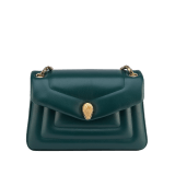 Serpenti Reverse small shoulder bag in ivory opal quilted Metropolitan calf leather with black nappa leather lining. Captivating snakehead magnetic closure in gold-plated brass embellished with red enamel eyes. 1244-MCL image 5