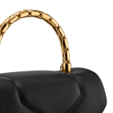 Serpenti Reverse small top handle bag in black quilted Metropolitan calf leather with black nappa leather lining. Captivating snakehead magnetic closure in gold-plated brass embellished with red enamel eyes. 1234-MCL image 5