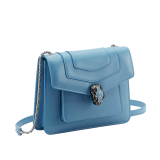 Serpenti Forever small crossbody bag in Niagara sapphire blue calf leather with silky coral pink grosgrain lining. Captivating snakehead closure in palladium-plated brass, embellished with black and Niagara sapphire blue enamel scales and black onyx eyes. 1184-CL image 2