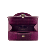 Serpenti Forever mini top handle bag in light amethyst pure karung with light amethyst nappa leather lining. Captivating snakehead magnetic closure in gold-plated brass embellished with light amethyst enamel and gold-plated brass scales, and black onyx eyes. SEA-001-1283XS-kar image 3