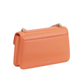 "Serpenti Forever" maxi chain pochette in Blush Quartz pink calf leather and Deep Garnet burgundy nappa leather. New Serpenti head closure in gold-plated brass, finished with red enamel eyes. SEA-XLCHAINPOUCH image 3