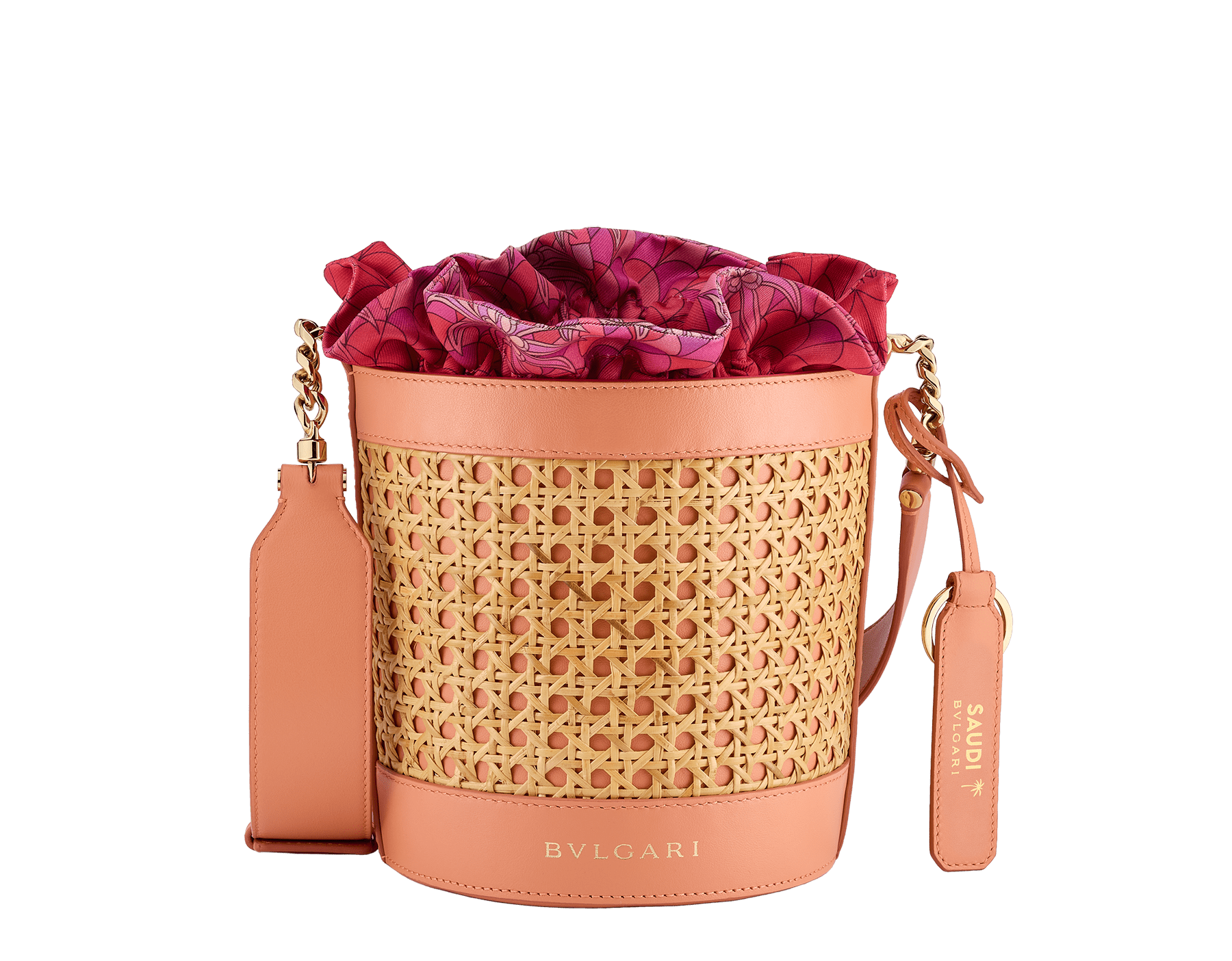 Serpenti Forever medium bucket bag in natural Vienna straw with coral carnelian orange calf leather details and customisable tag hot stamped with the "Saudi" inscription on one side. Detachable satin satchel with multicoloured print outside, beetroot spinel fuchsia inside, and drawstring closure with captivating snakeheads in light gold-plated brass. Special Resort Edition exclusive to Saudi Arabia. 292456 image 1