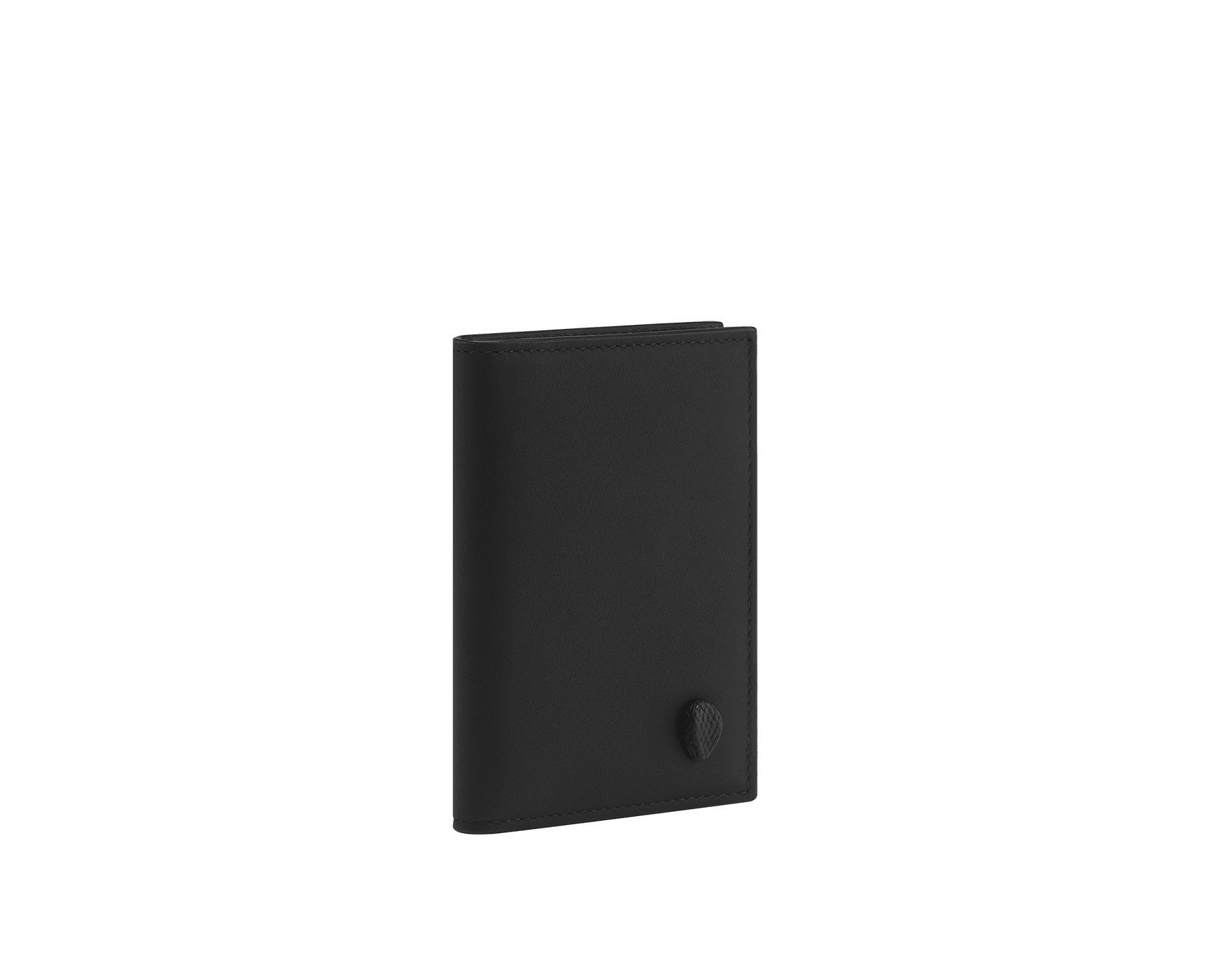 Serpenti Forever unisex folded card holder in black matt calf leather with black nappa leather interior. Captivating snakehead rivet in dark ruthenium-plated brass embellished with red enamel eyes, and press-stud closure. SEA-UNICCHOLDFOL image 1