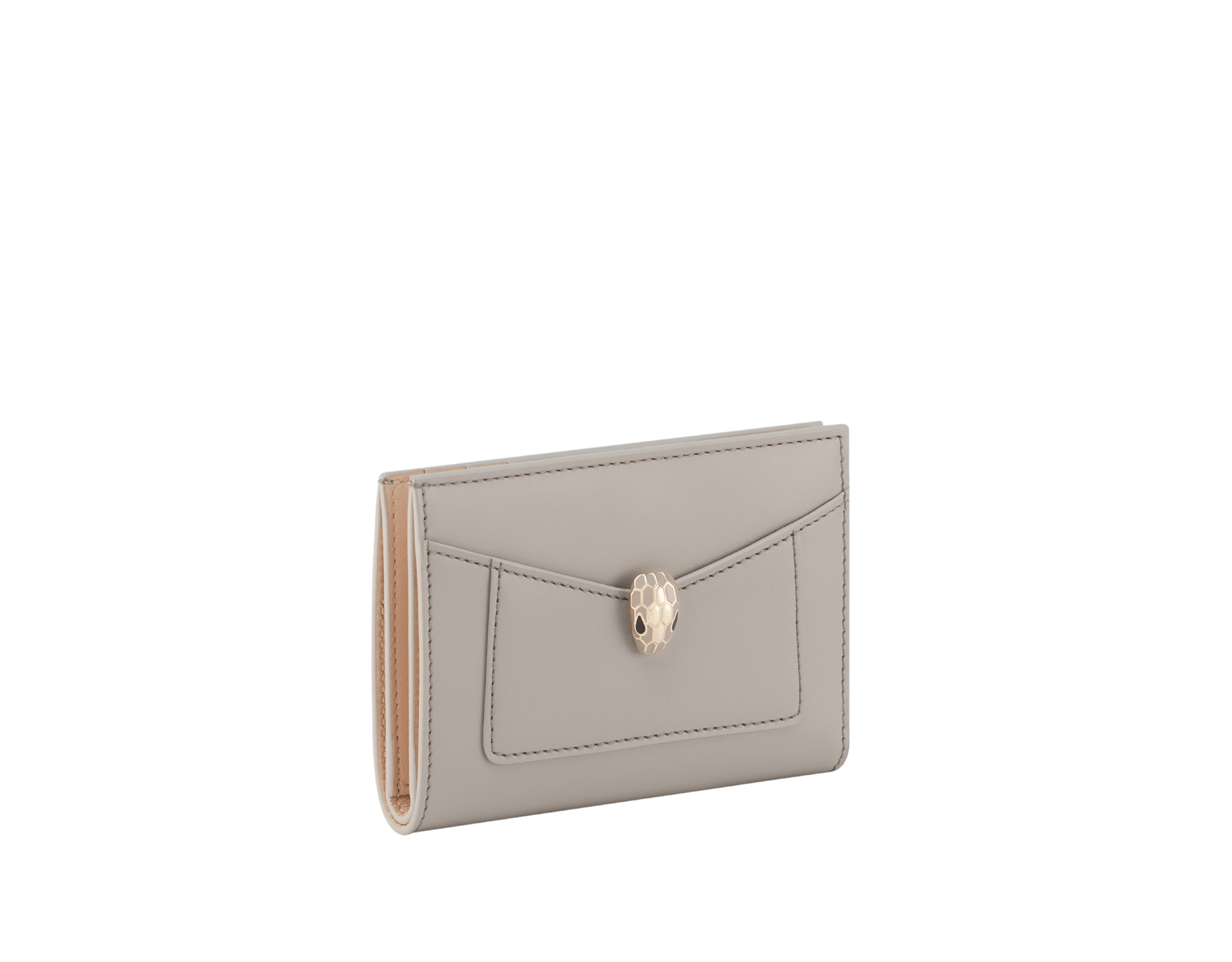 Serpenti Forever folded card holder in light gold Striated calf leather with linen agate nappa leather interior. Captivating snakehead décor in light gold-plated brass embellished with champagne enamel and light gold-plated brass scales, and black enamel eyes; press-button closure. SEA-CC-HOLD-FOLD-R image 1