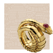 Serpenti Tubogas yellow gold watch from the 50s with cabochon gem on the head, Serpenti pattern.
