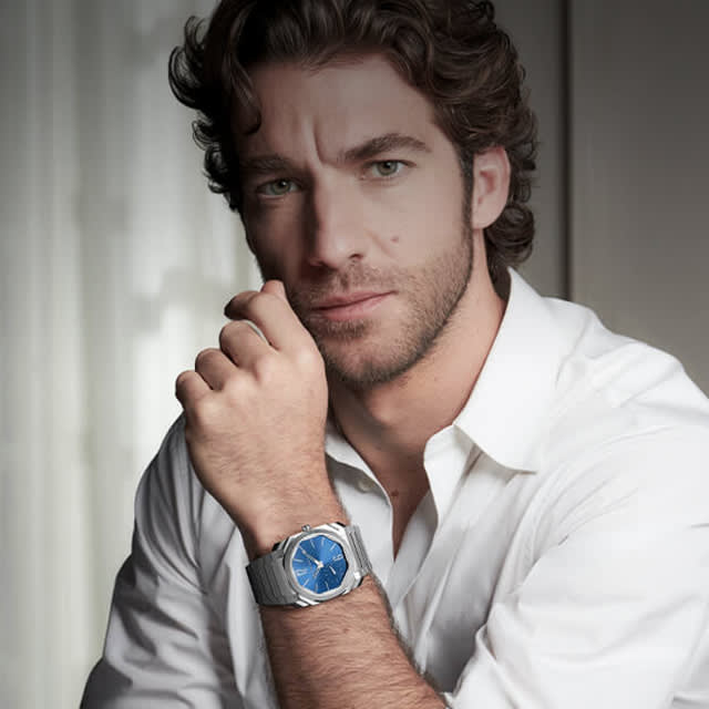 Lorenzo Viotti wearing the Octo Finissimo Automatic stainless steel watch with blue lacquered dial.