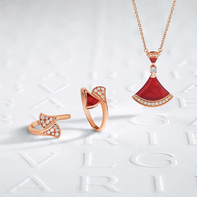 Divas' Dream rose gold necklaces and bracelet with diamonds and hard gemstones, creative shot.