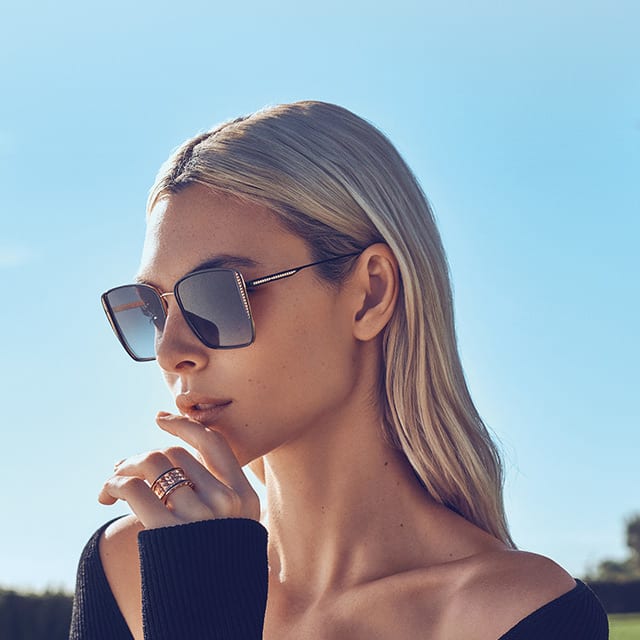 Vittoria Ceretti wearing B.zero1 Rock sunglasses with black metallic frame and golden studs detail.