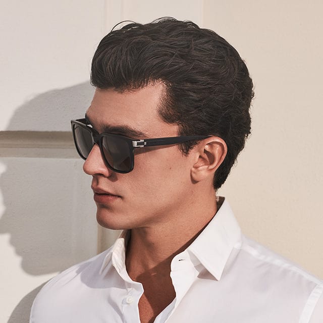 Xavier Serrano wearing Bulgari Aluminium black acetate sunglasses for the Bulgari Eyewear Campaign.