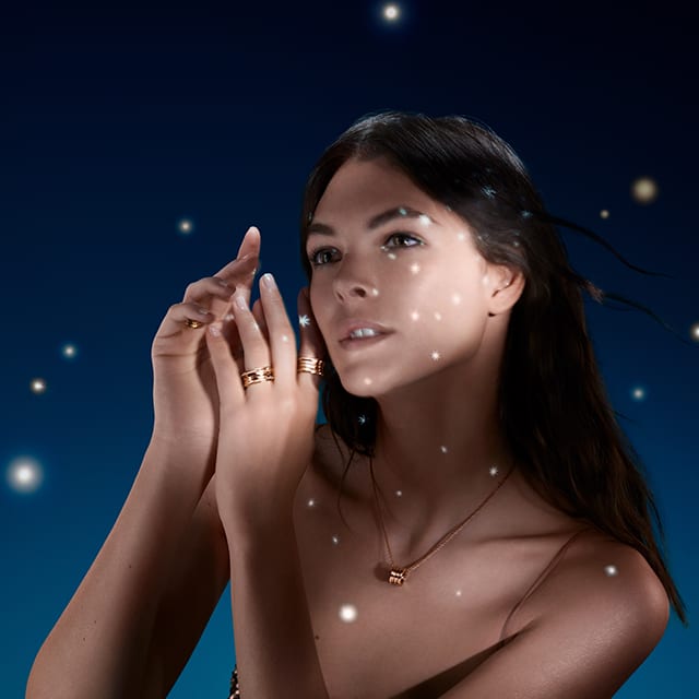 Vittoria Ceretti wearing a Bzero1 rings and necklace, starry night sky.