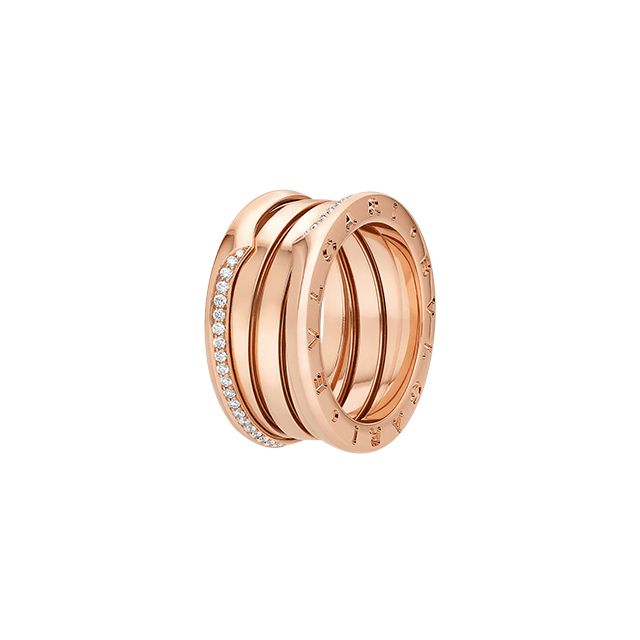 B.zero1 18 kt rose gold three-band ring set with demi-pavé diamonds on the edges.