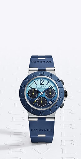 Bulgari Aluminium Capri Chronograph watch in aluminium and blue rubber with blue dial, logo backdrop.